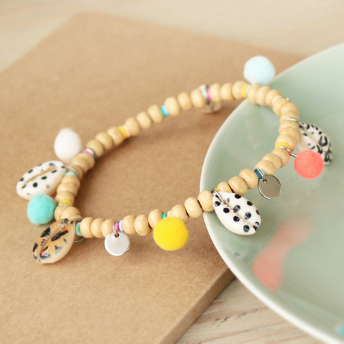 Check out how to make the best jewellery with Cowrie&rsquo;s and pompom charms: