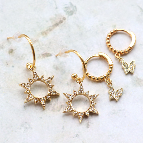 Trendy earrings and bracelets with zirconia charms and connectors: