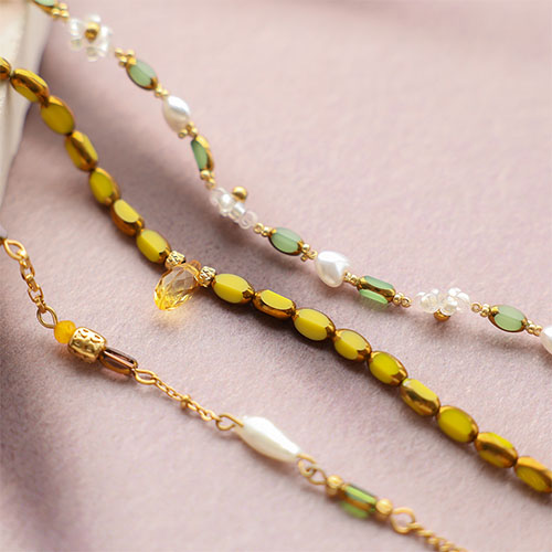 Get creative with oval glass beads with gold rim