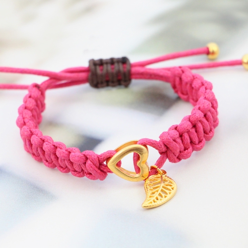 Fashionably bracelets made of waxed cord with different items of Designer Quality metal
