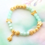 Jewellery with mint green Polaris Elements beads and golden details