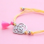 Bracelets of coloured cord with cute summery charms of stainless steel