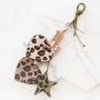 Keychains with pendants faux leather hairy, stainless steel and cheerful tassels