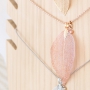 Delicate necklaces decorated with autumn leaf pendants 