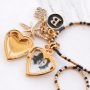 Create festive necklaces with pretty medallion, rhinestone and letter charms