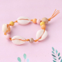 Beach jewellery with wooden beads, shells and DQ European metal