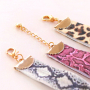Handmade statement earrings + bracelets with snake print 
