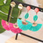Colourful earrings with new tassels, cowrie shells and DQ European metal