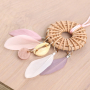Festival jewellery inspiration with feathers and rattan pendants