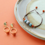 Amazing earrings and bracelets in warm colours made of new Polaris Elements beads