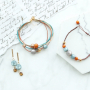 Amazing earrings and bracelets in warm colours made of new Polaris Elements beads