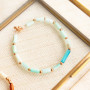 Summer jewellery with tube shell beads