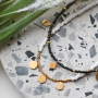 This trendy jewellery can be made with glass seed beads and stainless steel charms: