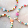 Read here how to make cheerful bracelets with the sea life and flower acrylic beads 