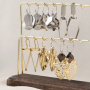 Earring inspiration with golden and silver charms and connectors