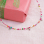 A Christmas collection with brightly coloured jewellery sets