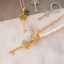 Design earrings and necklaces with key charms