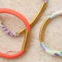 Get creative with stitched elastic ribbon Ibiza and stainless steel tube beads