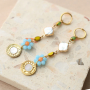 Get creative with oval glass beads with gold rim
