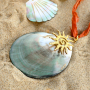 Get creative with large shell pendants and beads