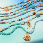 Create colourful necklaces with round glass beads