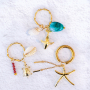 Inspiration with brass charms and summer details