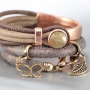 Nice stitched leather with beautiful findings and charms made of Designer Quality metal!