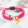 Fashionably bracelets made of waxed cord with different items of Designer Quality metal