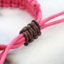 Fashionably bracelets made of waxed cord with different items of Designer Quality metal