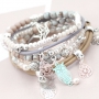 Trendy bracelets and earrings with Bohemian charms and fashionable beads