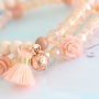 This summer look is made with the best beads in beautiful peach & coral shades. Love it!