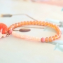 This summer look is made with the best beads in beautiful peach & coral shades. Love it!