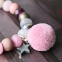 Trendy jewellery made of facet cut natural stone beads in pink and grey shades